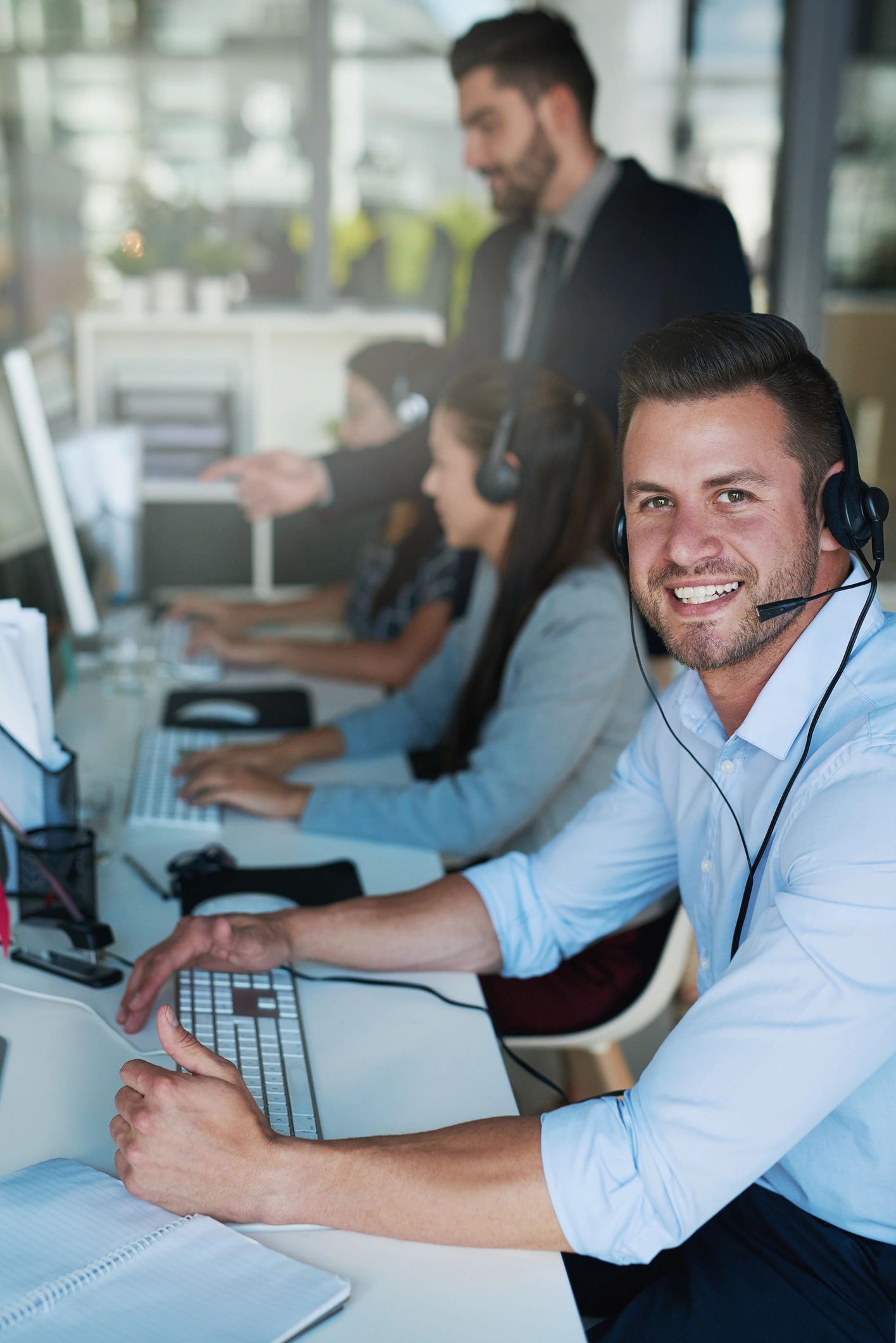 Customer support professional smiling